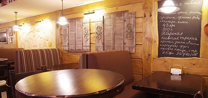 The atmosphere of the restaurant «Black pig». Promotion for all dishes