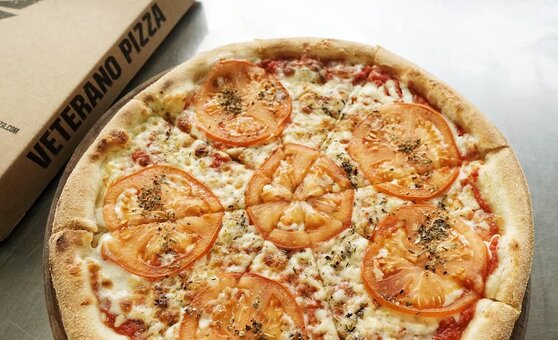 Акція на меню у ресторані Veterano Pizza. Бронюйте зі знижкою