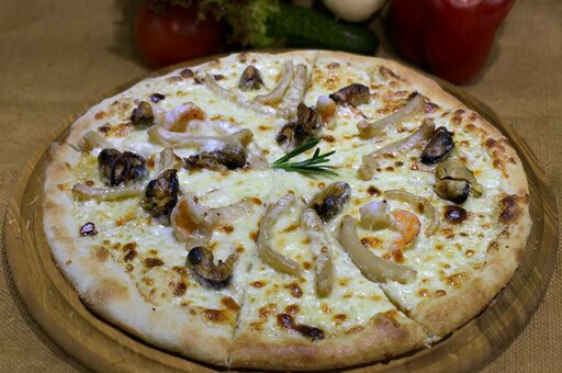 Discounts on pizza at the restaurant three fats in odessa