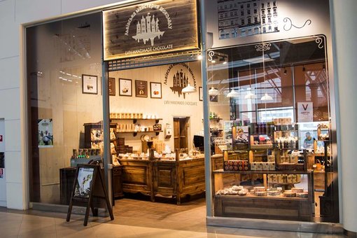 The interior of the cafe "Lviv Chocolate Workshop". Book a table at a discount